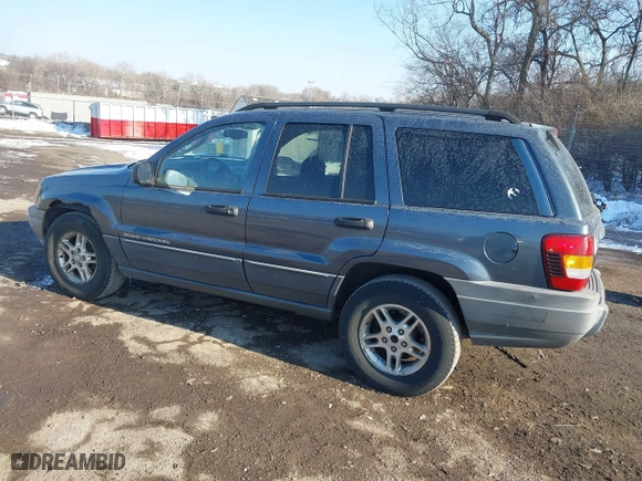 2002 Jeep Grand Cherokee Laredo with VIN 1J4GW48NX2C243282, listed as a IAAI auction lot 41362493 with 201,932 mi miles. Bid and sale history available at carsss.com. Image 3.