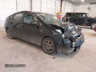 2007 Toyota Prius z VIN JTDKB20U877581010, wystawiony jako IAAI lot #42348084 z przebiegiem 210 677 mil mil oraz . Historia ofert i sprzedaży dostępna na DreamBid. Obrazek 1.