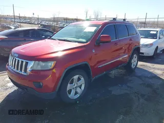 2011 Jeep Grand Cherokee 70th Anniversary with VIN 1J4RR4GT2BC703163, listed as a IAAI auction lot 41763149 with 184,523 mi miles. Bid and sale history available at carsss.com. Image 17.