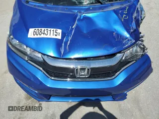 2019 Honda Fit LX z VIN 3HGGK5H43KM718172, wystawiony jako Copart lot #60843115 z przebiegiem 150 151 mil mil oraz Nie do naprawy • Non repairable. Historia ofert i sprzedaży dostępna na DreamBid. Obrazek 11.