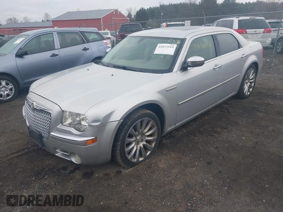 2009 Chrysler 300 with VIN 2C3LA63T89H622085, listed as a IAAI auction lot 41872519 with 151,543 mi miles. Bid and sale history available at carsss.com. Image 2.