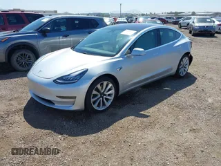 2018 Tesla Model 3 Long Range Battery with VIN 5YJ3E1EB5JF100578, listed as a IAAI auction lot 41959766 with 57,931 mi miles and . Bid and sale history available at DreamBid. Image 19.