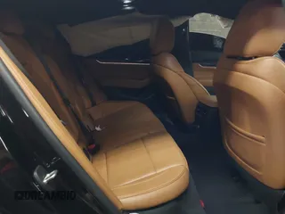 2020 Cadillac CT5 Sport z VIN 1G6DP5RK5L0121306, wystawiony jako IAAI lot #42097468 z przebiegiem 38 841 mil mil oraz . Historia ofert i sprzedaży dostępna na DreamBid. Obrazek 8.