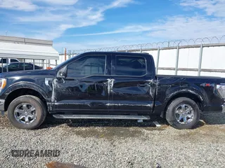 2023 Ford F-150 XL with VIN 1FTFW1E53PKG07088, listed as a IAAI auction lot 41442237 with 21,403 mi miles. Bid and sale history available at carsss.com. Image 6.