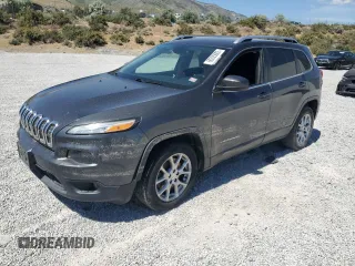 2016 Jeep Cherokee Latitude with VIN 1C4PJLCB3GW287223, listed as a Copart auction lot 60305005 with 167,434 mi miles and Salvage title. Bid and sale history available at DreamBid. Image 1.