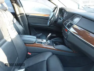2014 BMW X6 xDrive35i with VIN 5UXFG2C52E0C45044, listed as a IAAI auction lot 41711013 with 120,840 mi miles. Bid and sale history available at carsss.com. Image 5.