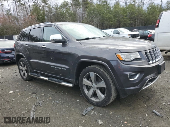 2015 Jeep Grand Cherokee Overland with VIN 1C4RJFCG0FC848046, listed as a Copart auction lot 49514795 with 212,688 mi miles and Clean title. Bid and sale history available at DreamBid. Image 4.