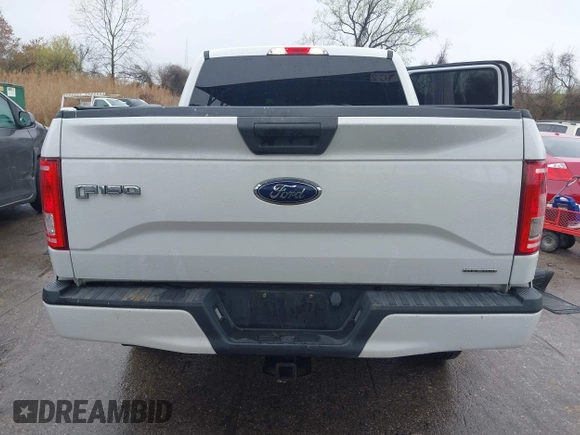 2015 Ford F-150 XLT with VIN 1FTEW1E80FFB30827, listed as a IAAI auction lot 41961072 with 155,206 mi miles and . Bid and sale history available at DreamBid. Image 16.
