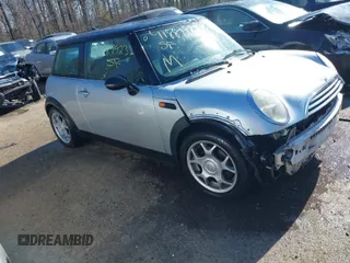 2006 MINI Hardtop with VIN WMWRC33546TK63877, listed as a IAAI auction lot 41887923 with 187,139 mi miles and . Bid and sale history available at DreamBid. Image 1.