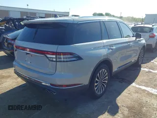 2021 Lincoln Aviator Reserve z VIN 5LM5J7WC6MGL12195, wystawiony jako IAAI lot #42159567 z przebiegiem 95 199 mil mil oraz . Historia ofert i sprzedaży dostępna na DreamBid. Obrazek 4.