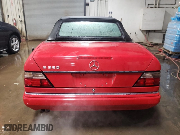 1994 Mercedes-Benz E 320 with VIN WDBEA66E8RC044069, listed as a Copart auction lot 87713565 with 69,061 mi miles and Salvage Title. Bid and sale history available at DreamBid. Image 6.