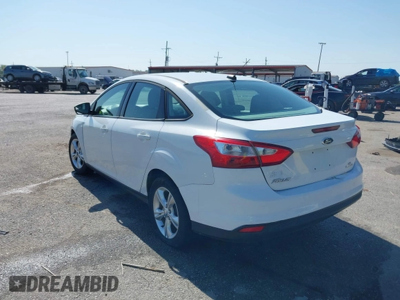2013 Ford Focus SE with VIN 1FADP3F26DL203377, listed as a IAAI auction lot 41998750 with 70,000 mi miles. Bid and sale history available at carsss.com. Image 3.