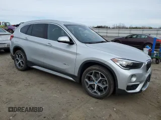 2018 BMW X1 sDrive28i with VIN WBXHU7C3XJ5H38873, listed as a Copart auction lot 49822205 with 46,847 mi miles and Salvage Title. Bid and sale history available at carsss.com. Image 4.