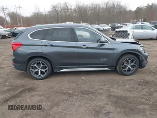 2017 BMW X1 xDrive28i with VIN WBXHT3C35H5F74213, listed as a IAAI auction lot 41589180 with 58,990 mi miles. Bid and sale history available at carsss.com. Image 12.