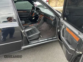 1994 Mercedes-Benz 400 with VIN WDBEA34E6RC103296, listed as a Copart auction lot 51020195 with 186,132 mi miles and Clean Title. Bid and sale history available at carsss.com. Image 5.