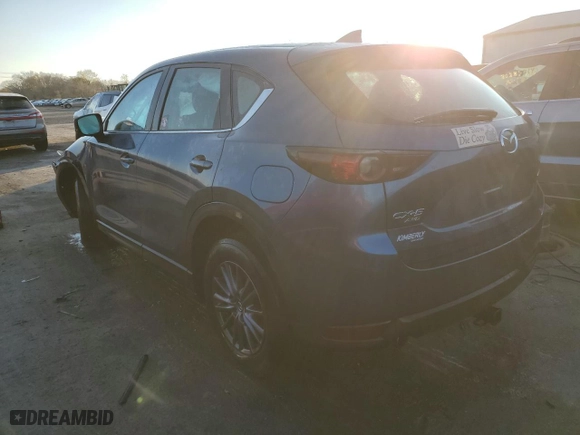 2017 Mazda CX-5 Sport with VIN JM3KFBBL6H0129258, listed as a Copart auction lot 80687694 with 106,120 mi miles and Salvage Title. Bid and sale history available at carsss.com. Image 2.