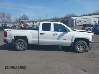 2014 Chevrolet Silverado 1500 Work Truck with VIN 1GCVKPEHXEZ294663, listed as a IAAI auction lot 41811465 with 124,587 mi miles and . Bid and sale history available at DreamBid. Image 13.