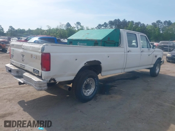 1996 Ford F-350 with VIN 1FTJW35F8TEA09134, listed as a IAAI auction lot 42120588 with 363,876 mi miles and . Bid and sale history available at DreamBid. Image 4.