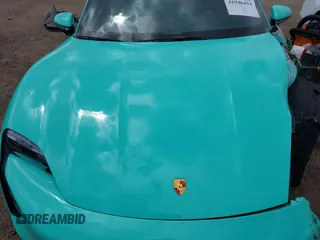 2022 Porsche Taycan 4S z VIN WP0AB2Y12NSA45396, wystawiony jako IAAI lot #41946433 z przebiegiem 9389 mil mil oraz . Historia ofert i sprzedaży dostępna na DreamBid. Obrazek 10.