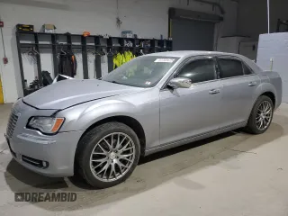 2014 Chrysler 300 C with VIN 2C3CCAKTXEH383941, listed as a Copart auction lot 41703475 with 105,709 mi miles and Salvage Title. Bid and sale history available at carsss.com. Image 1.