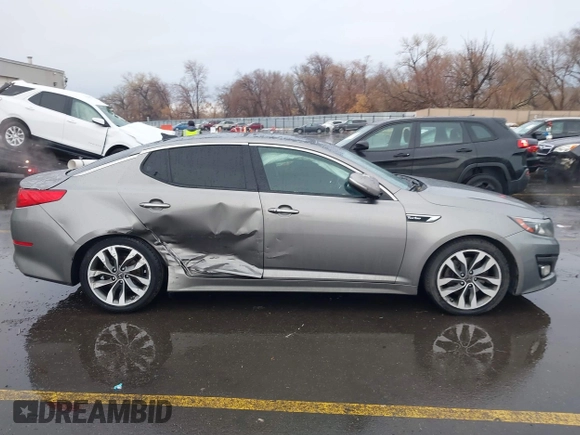 2015 Kia Optima SX Turbo with VIN 5XXGR4A66FG361755, listed as a IAAI auction lot 41199887 with 114,179 mi miles. Bid and sale history available at carsss.com. Image 13.