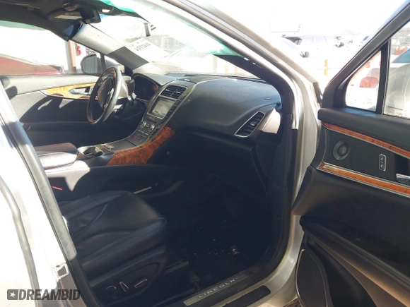 2019 Lincoln Nautilus Reserve with VIN 2LMPJ8LP2KBL65963, listed as a IAAI auction lot 41413314 with 52,012 mi miles. Bid and sale history available at carsss.com. Image 5.