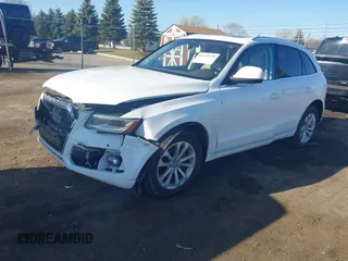 2014 Audi Q5 Premium Plus with VIN WA1LFAFP3EA106931, listed as a IAAI auction lot 41933150 with 140,104 mi miles and . Bid and sale history available at DreamBid. Image 2.