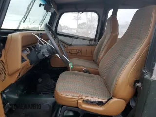 1995 Jeep Wrangler S with VIN 1J4FY19P5SP256440, listed as a Copart auction lot 82270794 with 169,070 mi miles and Clean Title. Bid and sale history available at carsss.com. Image 7.