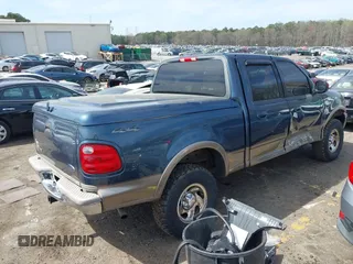 2003 Ford F-150 XLT with VIN 1FTRW08L33KB05743, listed as a IAAI auction lot 41828979 with 117,345 mi miles. Bid and sale history available at carsss.com. Image 4.