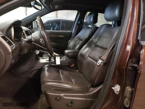 2014 Jeep Grand Cherokee Summit with VIN 1C4RJFJG2EC404605, listed as a Copart auction lot 52082335 with 157,220 mi miles and Clean Title. Bid and sale history available at carsss.com. Image 7.