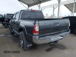2015 Toyota Tacoma with VIN 3TMLU4EN8FM167337, listed as a IAAI auction lot 42117662 with 60,929 mi miles. Bid and sale history available at carsss.com. Image 3.