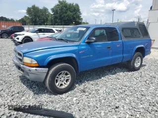 2001 Dodge Dakota Sport z VIN 1B7GG22N61S246488, wystawiony jako Copart lot #55650825 z przebiegiem 142 192 mil mil oraz Szkoda całkowita • Salvage title. Historia ofert i sprzedaży dostępna na DreamBid. Obrazek 1.