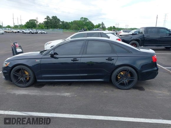 2014 Audi A6 Prestige with VIN WAUHGAFC6EN141698, listed as a IAAI auction lot 42330033 with 174,401 mi miles and . Bid and sale history available at DreamBid. Image 14.
