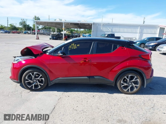 2020 Toyota C-HR LE with VIN JTNKHMBX3L1066720, listed as a IAAI auction lot 42042139 with 98,925 mi miles and . Bid and sale history available at DreamBid. Image 14.