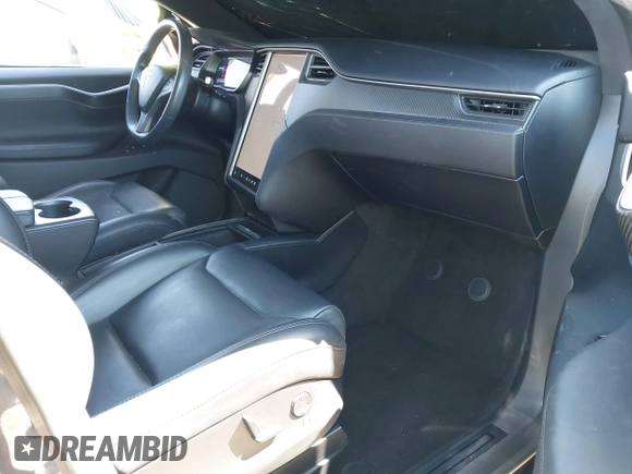 2018 Tesla Model X 75D with VIN 5YJXCBE26JF121937, listed as a IAAI auction lot 41652666 with 93,478 mi miles and . Bid and sale history available at carsss.com. Image 5.