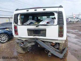 2004 Hummer H2 with VIN 5GRGN23U64H122670, listed as a IAAI auction lot 41908517 with 189,736 mi miles. Bid and sale history available at carsss.com. Image 16.