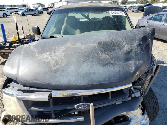 1998 Ford F-150 с VIN 1FTZX18W4WKA79557, выставлен на аукционе Copart как лот 48406375 с пробегом 192 577 миль миль и Списание • Salvage title. История ставок и продаж доступна на DreamBid. Изображение 12.