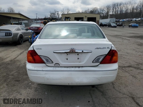 2002 Toyota Avalon XL with VIN 4T1BF28B42U250096, listed as a Copart auction lot 51817975 with 154,305 mi miles and Salvage Title. Bid and sale history available at DreamBid. Image 6.
