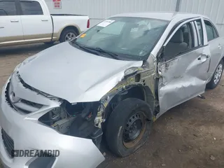 2013 Toyota Corolla L with VIN 5YFBU4EE8DP161765, listed as a IAAI auction lot 42109708 with 105,931 mi miles and . Bid and sale history available at DreamBid. Image 6.