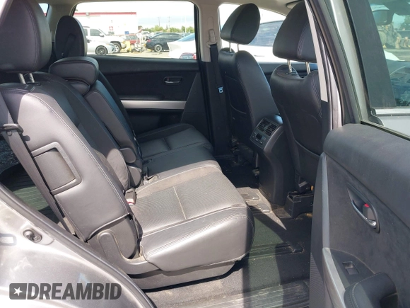 2014 Mazda CX-9 Grand Touring z VIN JM3TB2DVXE0432991, wystawiony jako IAAI lot #42826784 z przebiegiem 134 265 mil mil oraz . Historia ofert i sprzedaży dostępna na DreamBid. Obrazek 8.