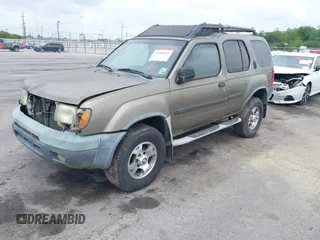 2001 Nissan Xterra XE z VIN 5N1ED28T51C588588, wystawiony jako IAAI lot #41950312 z przebiegiem 258 890 mil mil oraz . Historia ofert i sprzedaży dostępna na DreamBid. Obrazek 2.