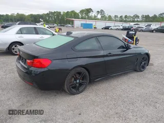 2015 BMW 4 Series 428i with VIN WBA3N3C55FK232319, listed as a IAAI auction lot 42136421 with 140,300 mi miles and . Bid and sale history available at DreamBid. Image 4.
