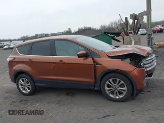 2017 Ford Escape SE with VIN 1FMCU9GD5HUA57132, listed as a IAAI auction lot 42075470 with 106,271 mi miles. Bid and sale history available at carsss.com. Image 13.