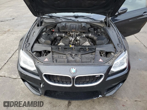2014 BMW M6 z VIN WBSLZ9C50EDZ78599, wystawiony jako Copart lot #84724974 z przebiegiem 115 051 mil mil oraz Czysty tytuł • Clean title. Historia ofert i sprzedaży dostępna na DreamBid. Obrazek 11.