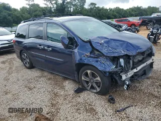 2019 Honda Odyssey Touring z VIN 5FNRL6H8XKB027156, wystawiony jako Copart lot #60735455 z przebiegiem 100 044 mil mil oraz Szkoda całkowita • Salvage title. Historia ofert i sprzedaży dostępna na DreamBid. Obrazek 4.