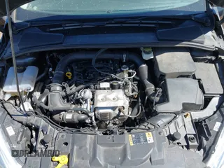 2018 Ford Focus SE with VIN 1FADP3FE6JL270910, listed as a IAAI auction lot 42130371 with 121,240 mi miles. Bid and sale history available at carsss.com. Image 10.
