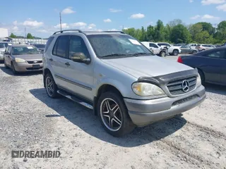 1998 Mercedes-Benz M-Class with VIN 4JGAB54E3WA031579, listed as a IAAI auction lot 42004335 with 156,898 mi miles. Bid and sale history available at carsss.com. Image 1.