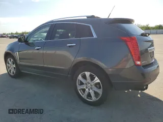 2013 Cadillac SRX Performance Collection with VIN 3GYFNHE36DS582725, listed as a Copart auction lot 50722535 with 137,164 mi miles and Salvage Title. Bid and sale history available at carsss.com. Image 2.