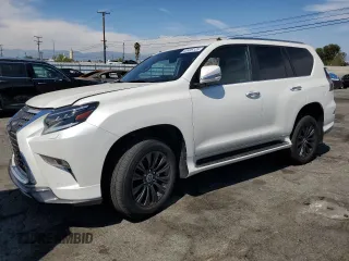 2023 Lexus GX 460 Premium z VIN JTJAM7BXXP5381653, wystawiony jako Copart lot #52405135 z przebiegiem 20 574 mil mil oraz Szkoda całkowita • Salvage title. Historia ofert i sprzedaży dostępna na DreamBid. Obrazek 1.
