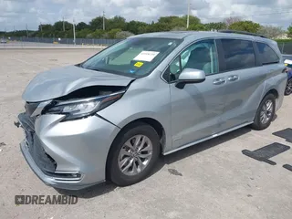 2021 Toyota Sienna XLE with VIN 5TDYRKEC2MS072800, listed as a IAAI auction lot 41918739 with 47,921 mi miles and . Bid and sale history available at DreamBid. Image 2.